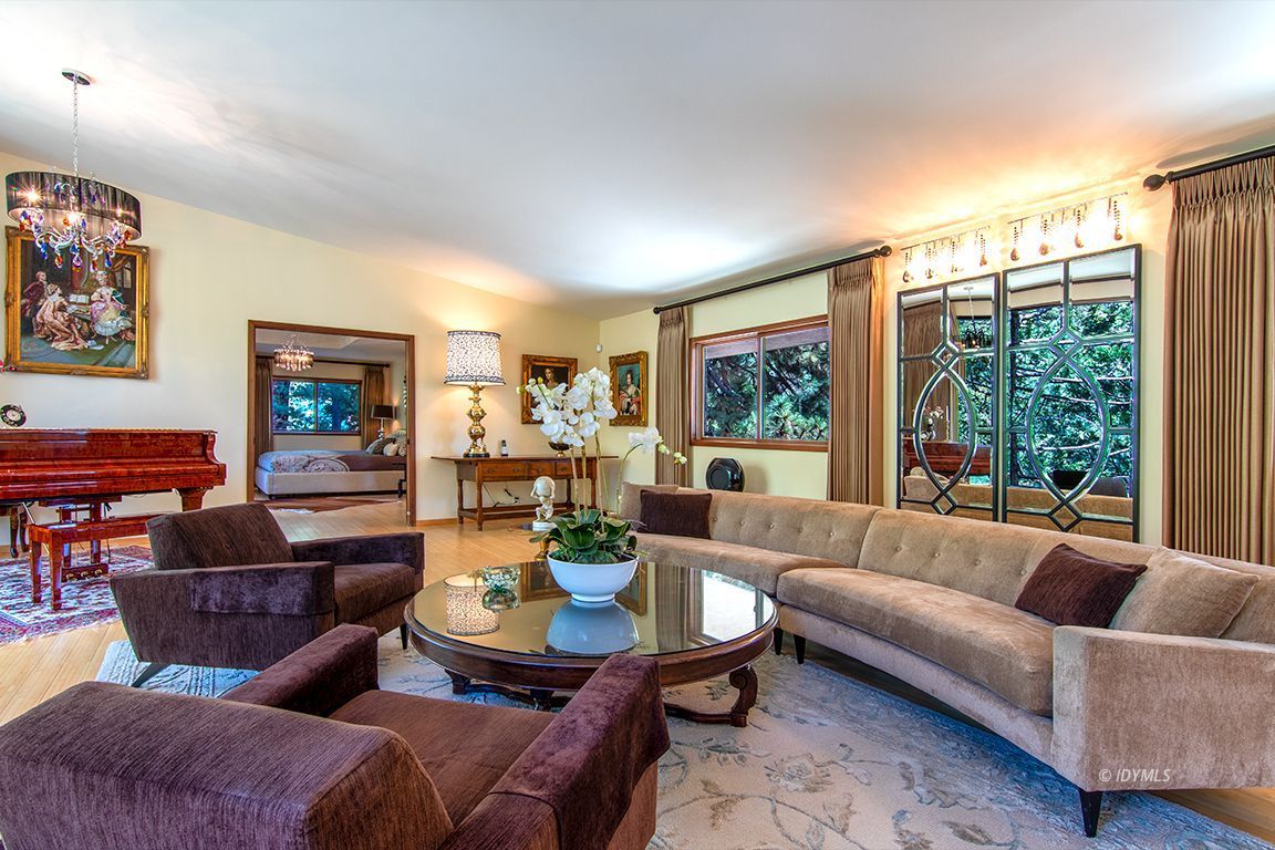 55596 Encino Road Idyllwild, CA 92549 - Photo 33 of 74 a living room with furniture and a large window