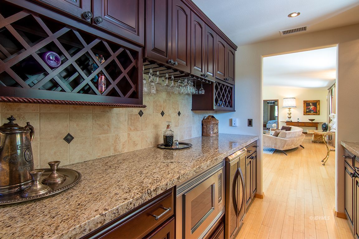 55596 Encino Road Idyllwild, CA 92549 - Photo 56 of 74 a kitchen with stainless steel appliances granite countertop a sink stove and cabinets