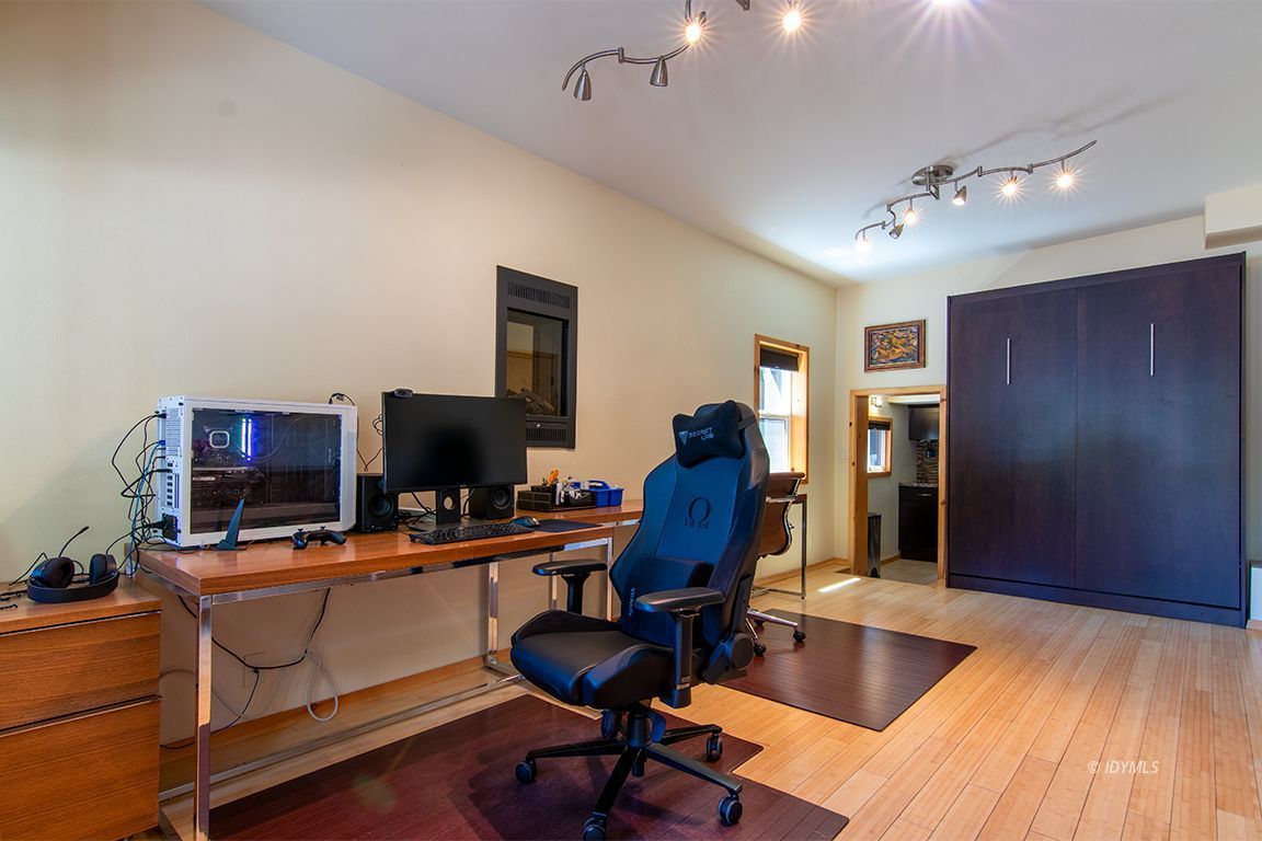 55596 Encino Road Idyllwild, CA 92549 - Photo 66 of 74 a view of a workspace with furniture and a window