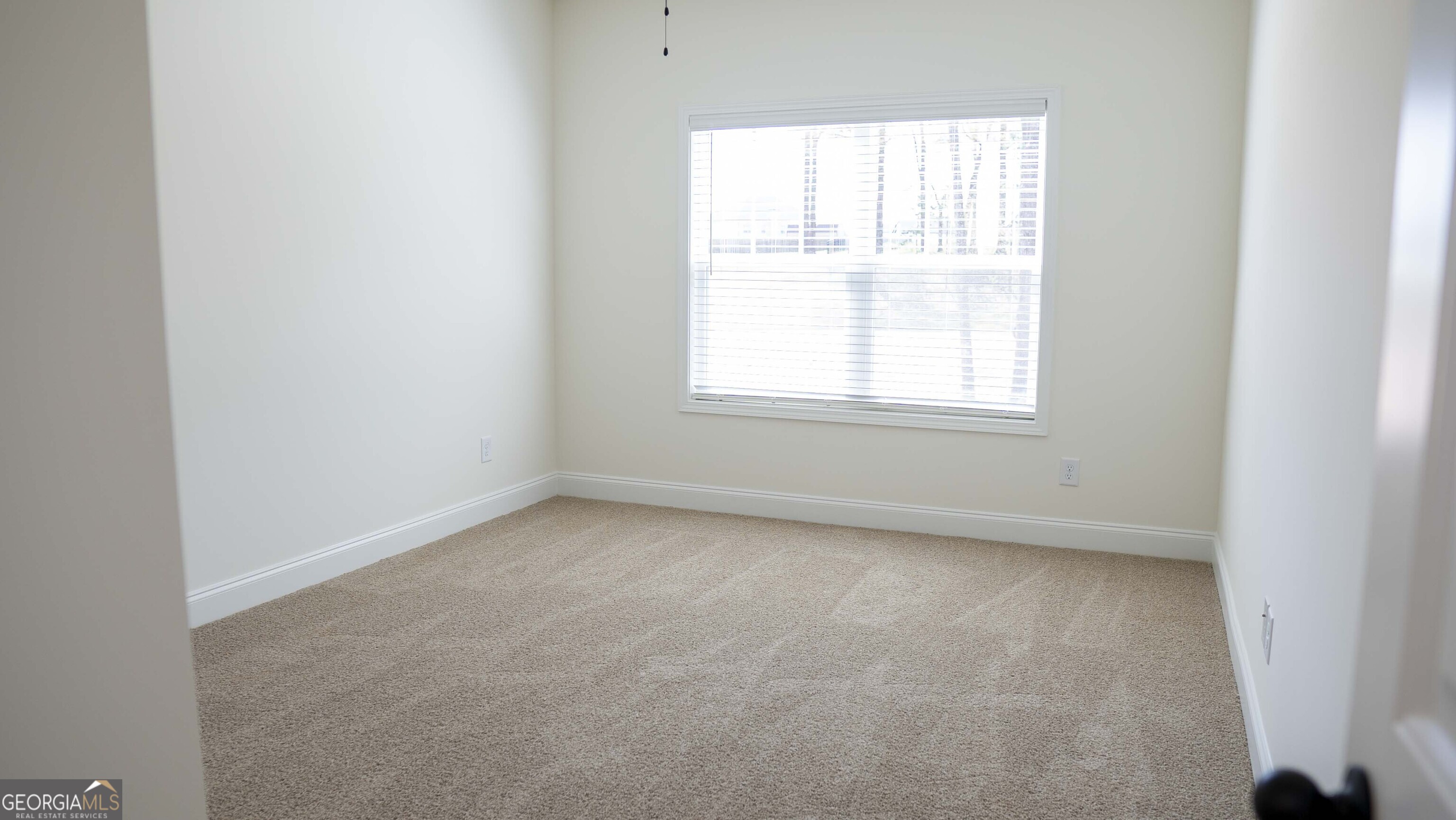 604 Beaver Court Perry, GA 31069 - Photo 25 of 40 an empty room with a window