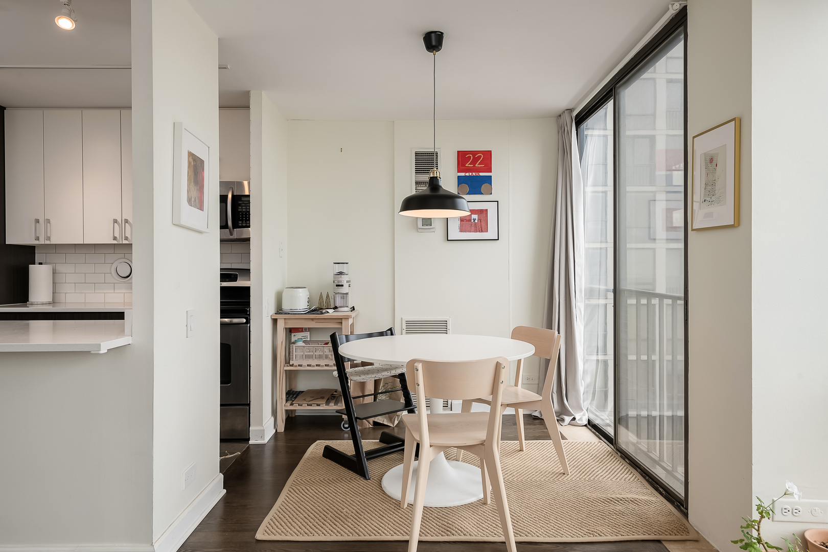 345 West Fullerton Parkway, Unit 1706 Chicago, IL 60614 - Photo 12 of 26 a view of a dining room with furniture