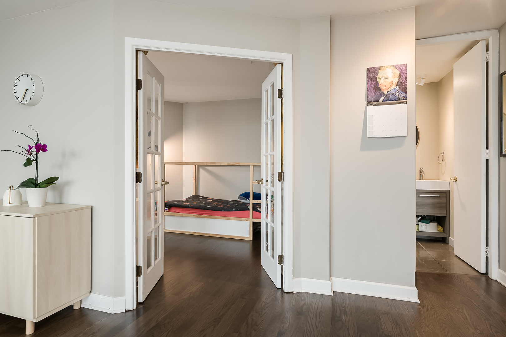 345 West Fullerton Parkway, Unit 1706 Chicago, IL 60614 - Photo 15 of 26 a view of a livingroom with wooden floor and a hallway
