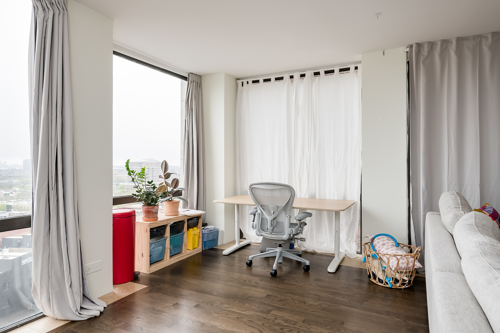 345 West Fullerton Parkway, Unit 1706 Chicago, IL 60614 - Photo 16 of 26 a living room with furniture a rug and a window