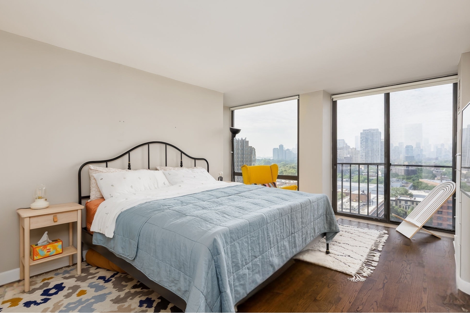 345 West Fullerton Parkway, Unit 1706 Chicago, IL 60614 - Photo 18 of 26 a bedroom with a bed a table and window