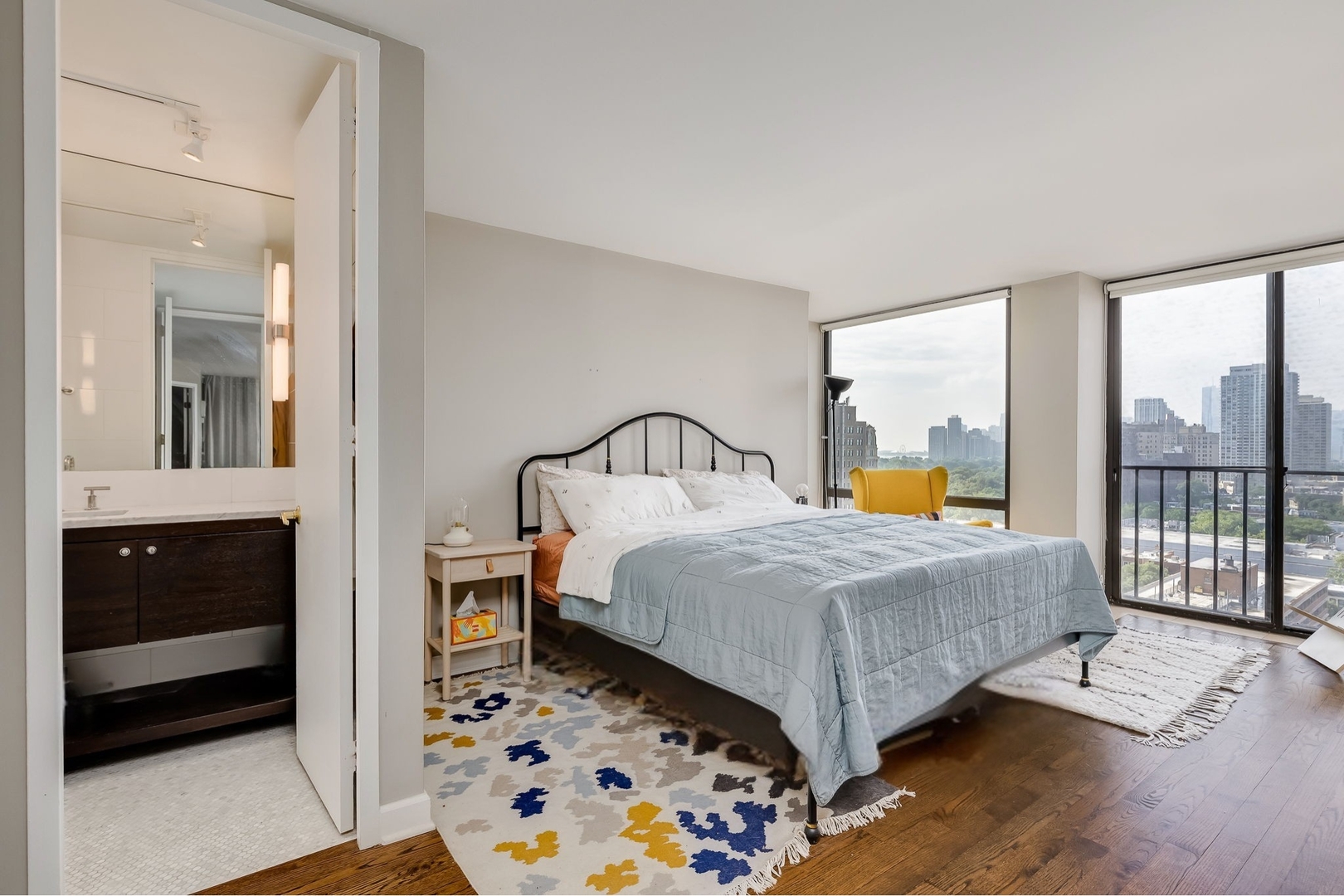 345 West Fullerton Parkway, Unit 1706 Chicago, IL 60614 - Photo 21 of 26 a bedroom with a bed and a window