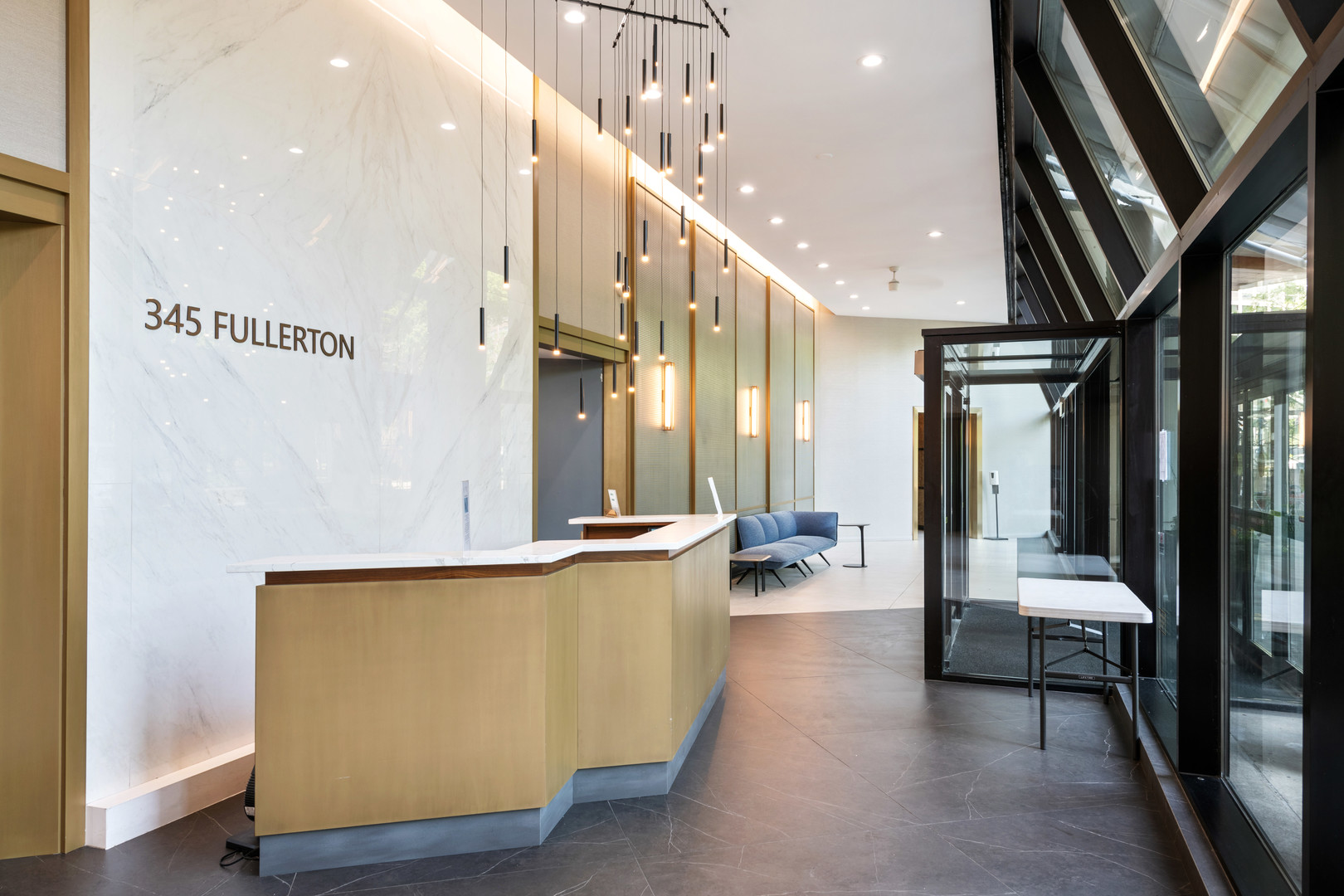 345 West Fullerton Parkway, Unit 1706 Chicago, IL 60614 - Photo 4 of 26 a lobby with furniture and floor to ceiling window