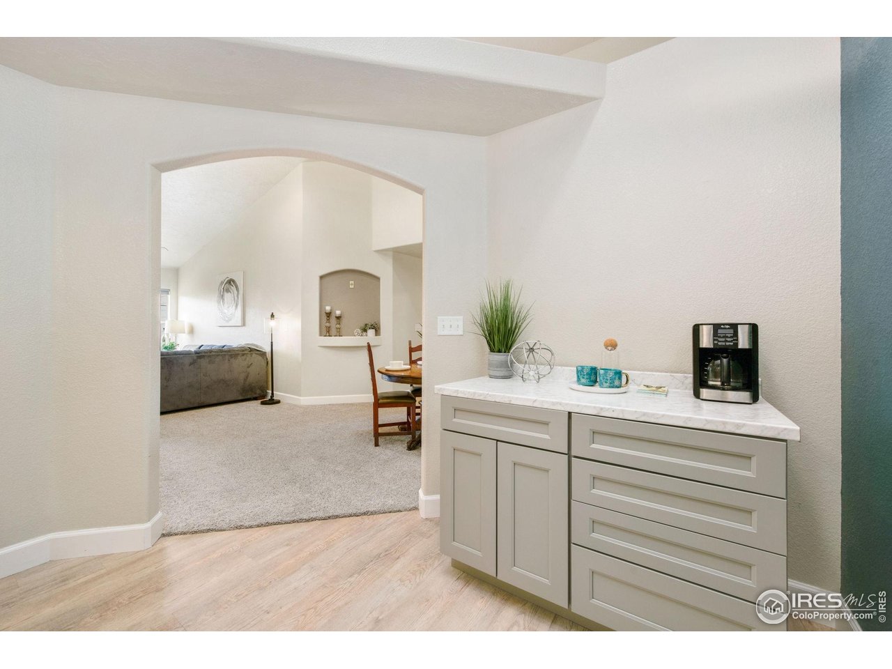 5775 29th Street, Unit 1307 Greeley, CO 80634 - Photo 6 of 28 a en suite bathroom with a sink and a mirror