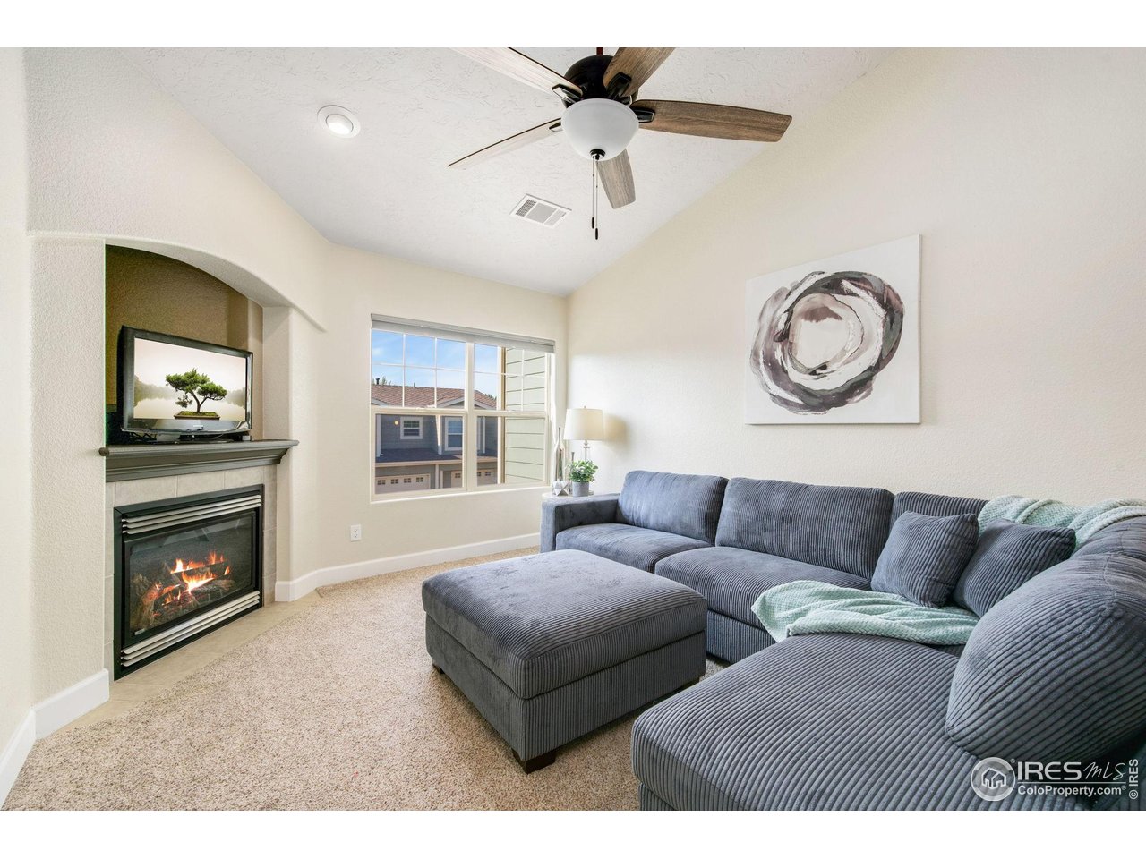 5775 29th Street, Unit 1307 Greeley, CO 80634 - Photo 9 of 28 Bright and inviting living space with designer paint throughout.