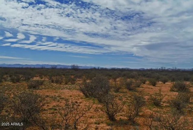 a view of lake and mountain