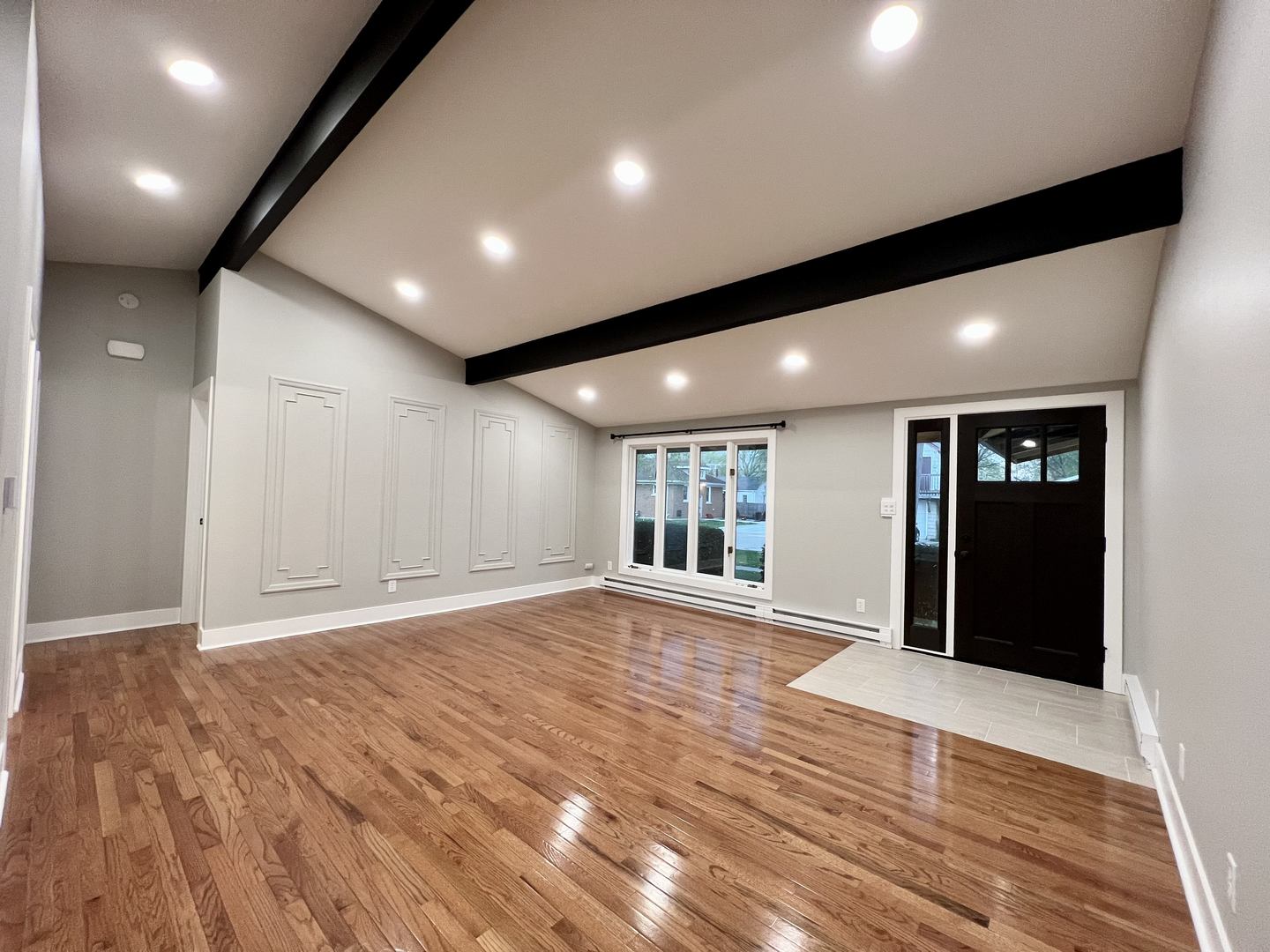 515 South Street Lockport, IL 60441 - Photo 7 of 22 a view of an empty room with wooden floor and staircase