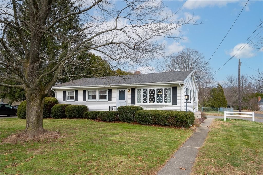 660 Morgan Road West Springfield, MA 01089 - Photo 1 of 42 a front view of a house with a garden