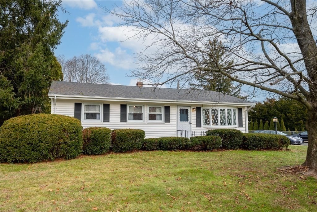 660 Morgan Road West Springfield, MA 01089 - Photo 3 of 42 a front view of a house with a garden