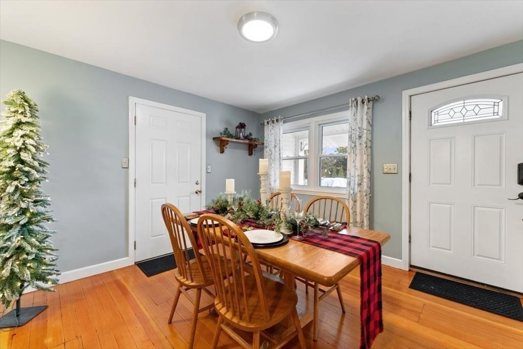 660 Morgan Road West Springfield, MA 01089 - Photo 6 of 42 a view of a dining room with furniture and wooden floor