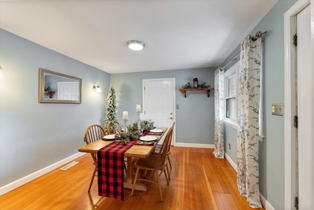 660 Morgan Road West Springfield, MA 01089 - Photo 8 of 42 a dining room with furniture and wooden floor