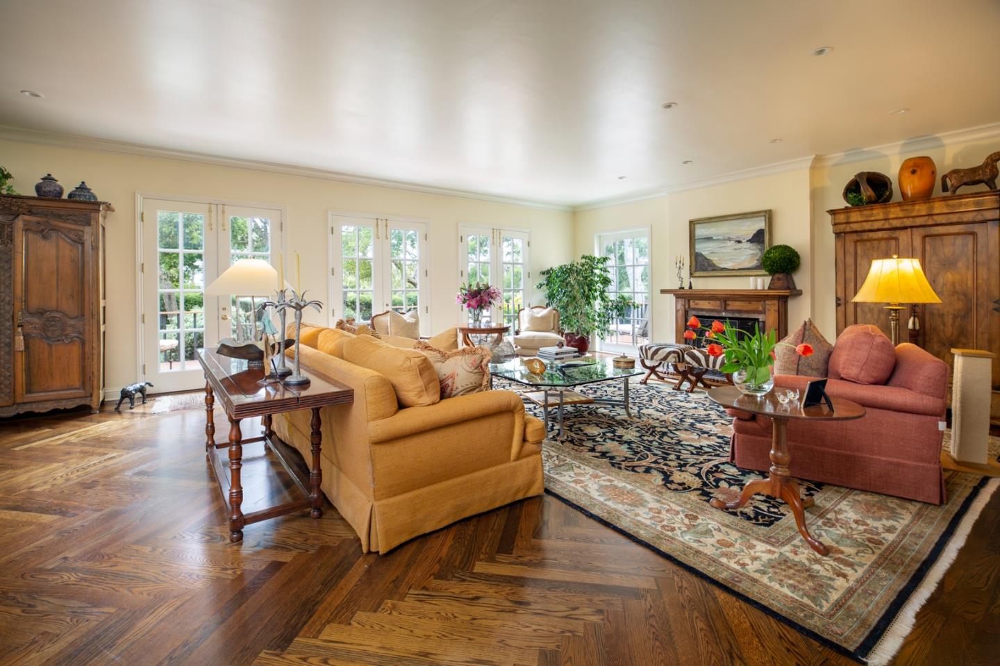 1534 Riata Road Pebble Beach, CA 93953 - Photo 2 of 50 a living room with furniture fireplace and a flat screen tv