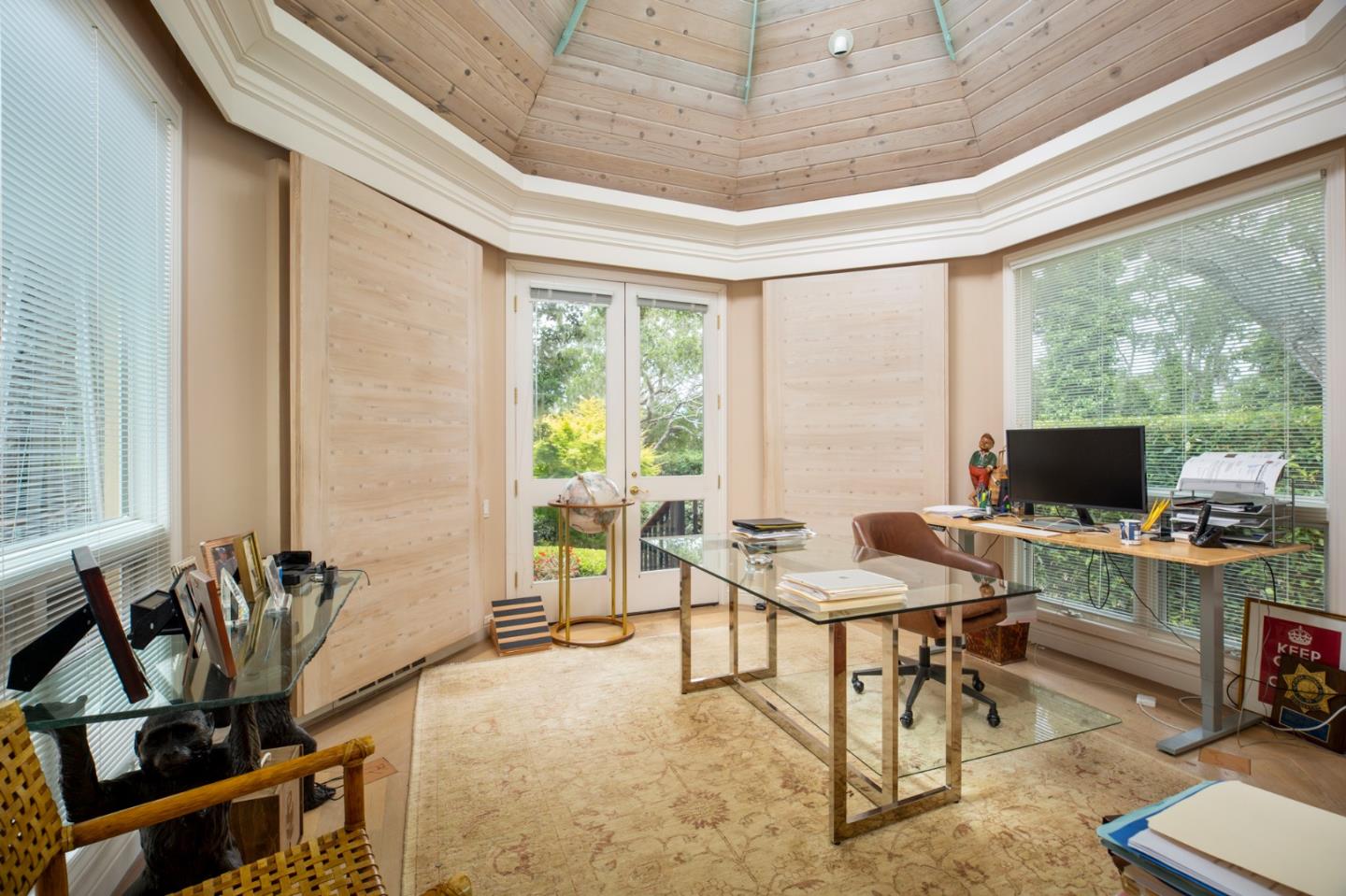 1534 Riata Road Pebble Beach, CA 93953 - Photo 22 of 50 a view of a workspace with furniture and a window