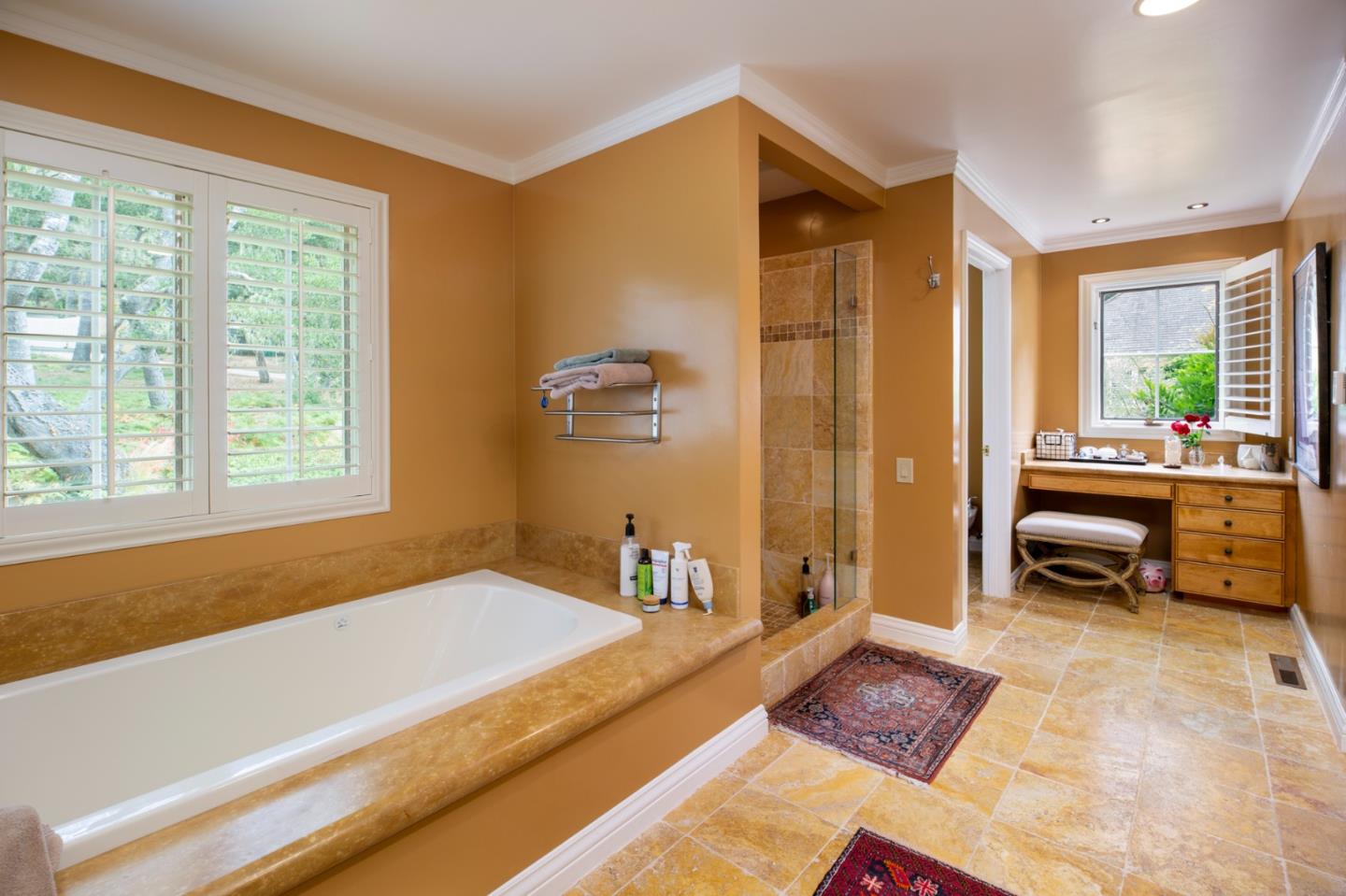 1534 Riata Road Pebble Beach, CA 93953 - Photo 27 of 50 a bedroom with a bed and a couch