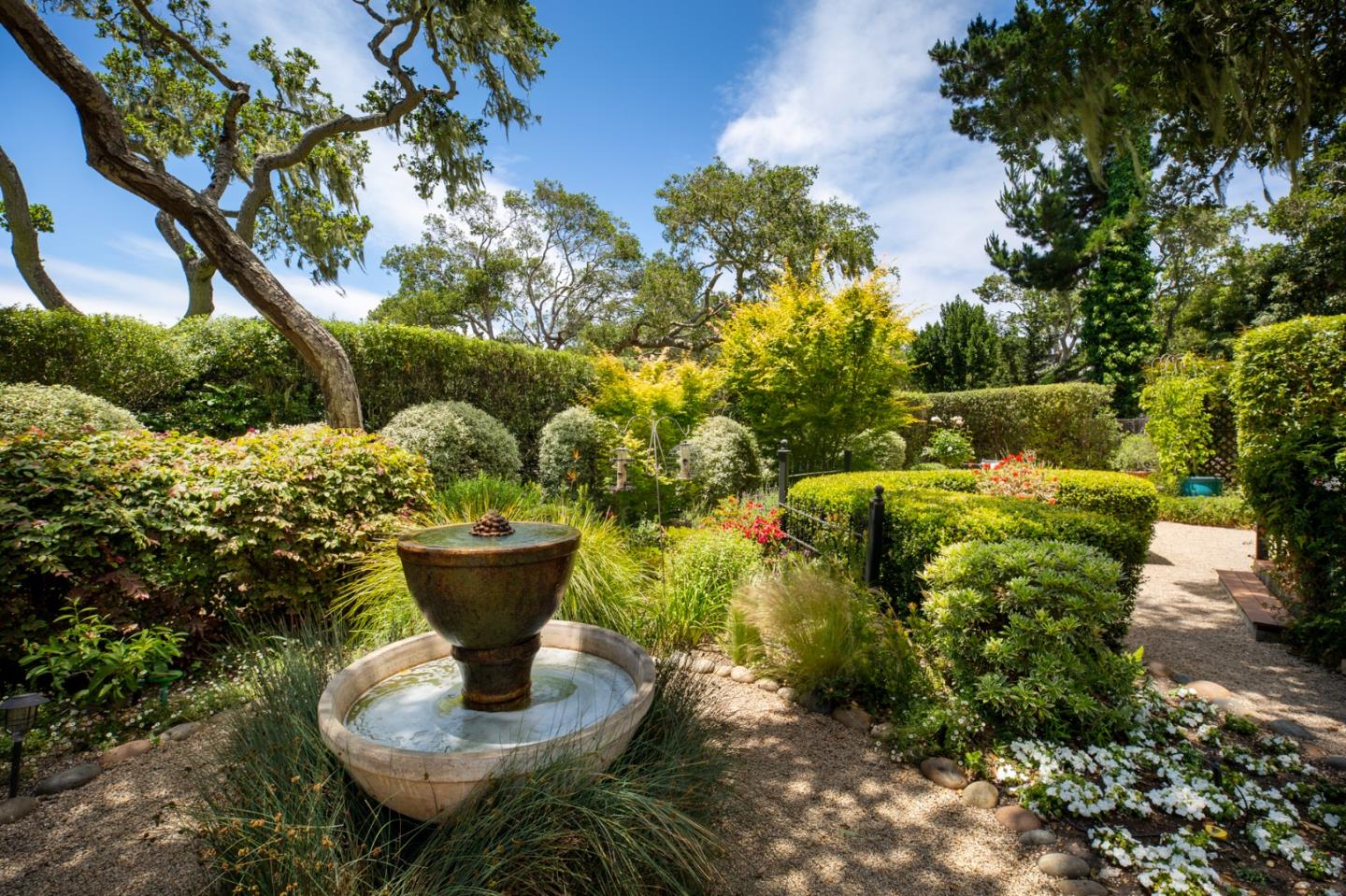 1534 Riata Road Pebble Beach, CA 93953 - Photo 40 of 50 a view of a fountain in the yard