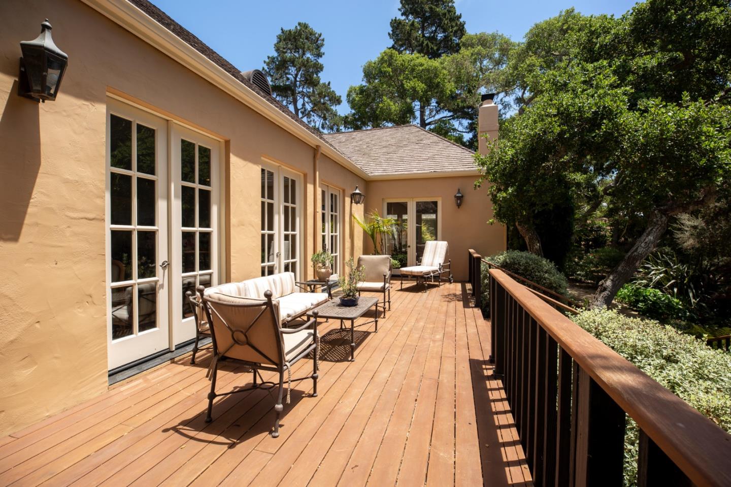 1534 Riata Road Pebble Beach, CA 93953 - Photo 46 of 50 a balcony with wooden floor and furniture