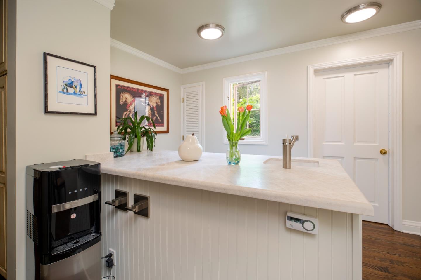 1534 Riata Road Pebble Beach, CA 93953 - Photo 8 of 50 a kitchen with stainless steel appliances granite countertop a sink a stove and a refrigerator