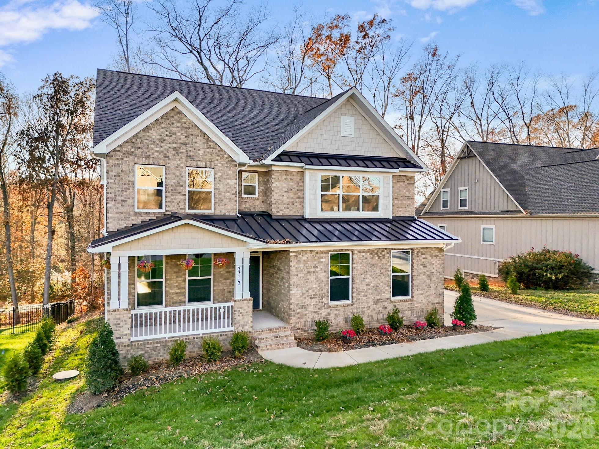 7717 Nautical View Denver, NC 28037 - Photo 2 of 43 front view of a house with a yard