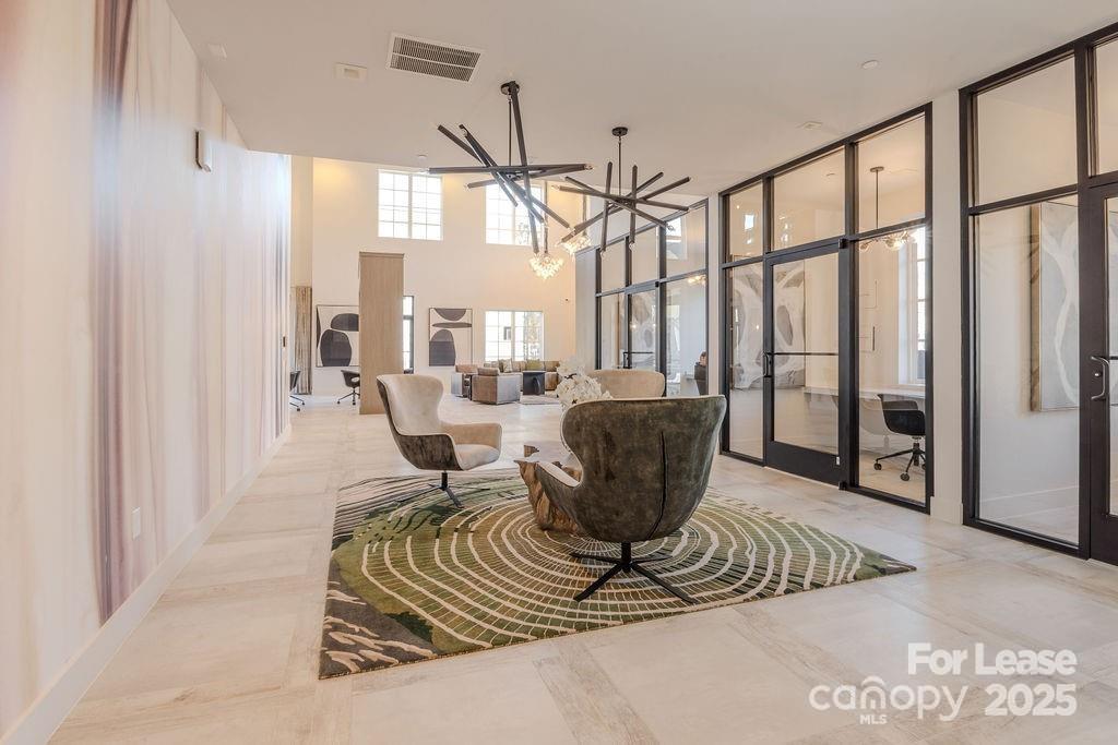 3110 Doe River Way, Unit RHODES Matthews, NC 28105 - Photo 17 of 48 a living room with furniture