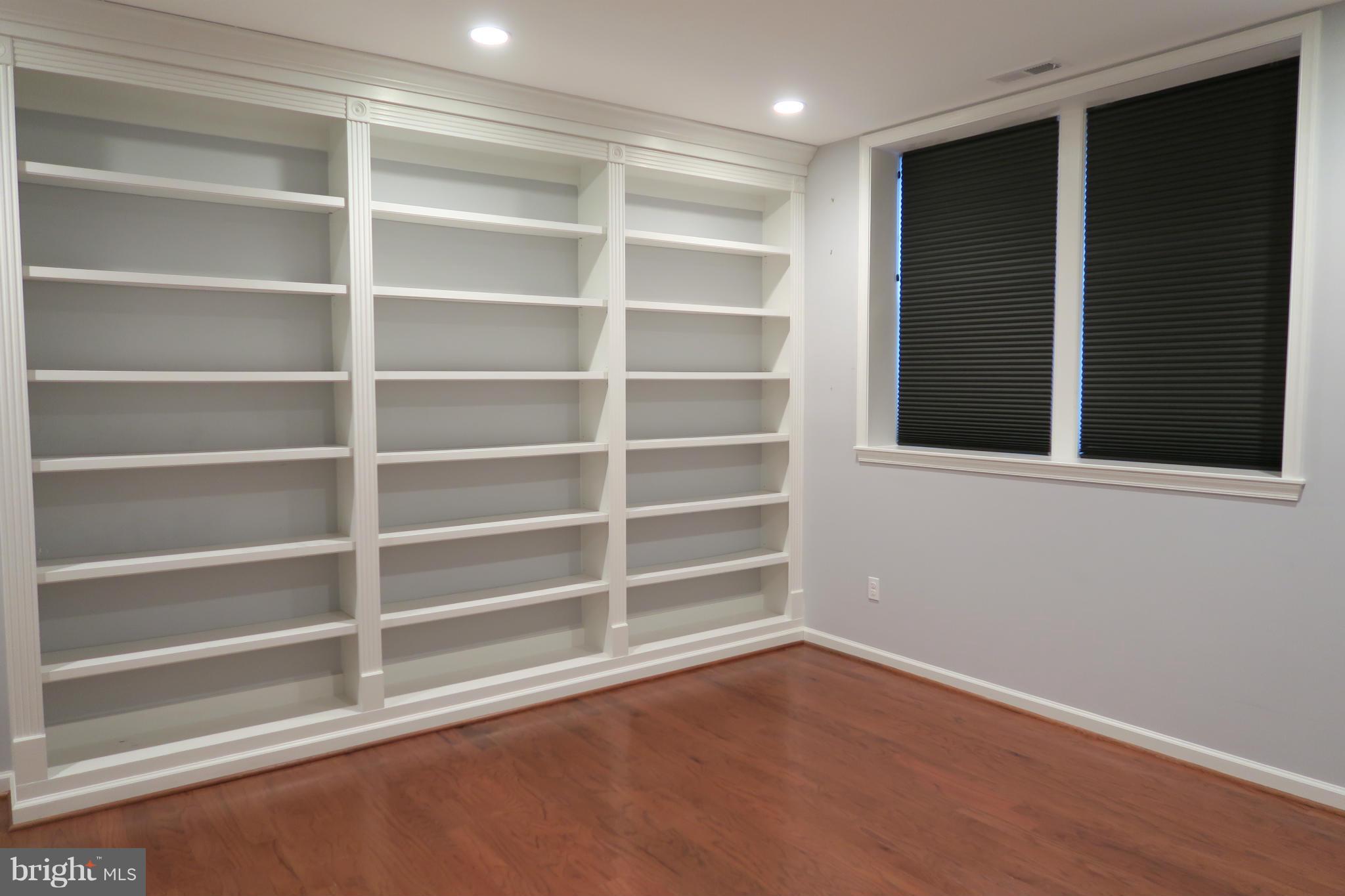 725 Ridgemont Avenue Rockville, MD 20850 - Photo 11 of 17 a view of an empty room with empty racks