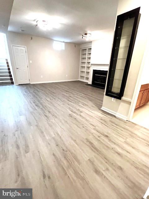 725 Ridgemont Avenue Rockville, MD 20850 - Photo 17 of 17 an empty room with wooden floor and windows