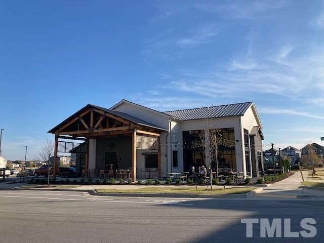 5021 Crescent Square Street, Unit 2428 Raleigh, NC 27616 - Photo 5 of 6 a front view of a building with street view