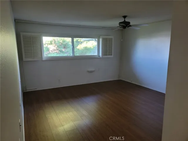 a bathroom with a shower and a toilet