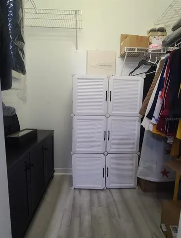 a view of a walk in closet