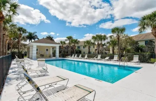 a view of a house with swimming pool