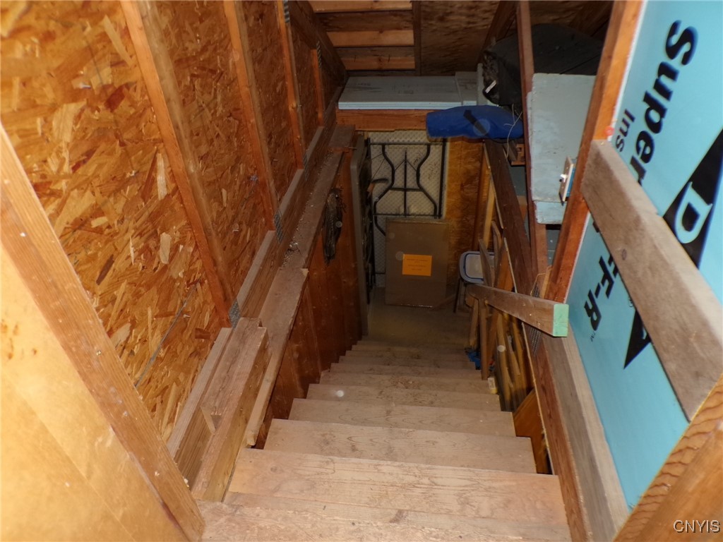 7180 Glur Road Rome, NY 13440 - Photo 47 of 49 stairs to garage storage room