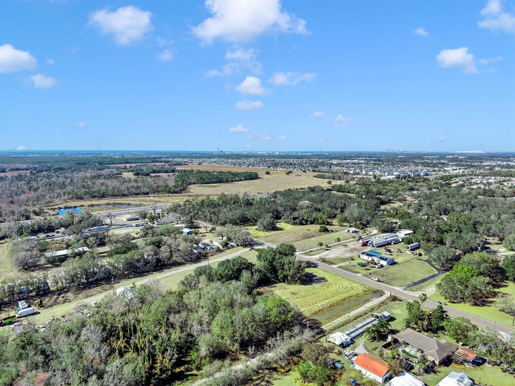 10611 Sumner Road Wimauma, FL 33598 - Photo 11 of 30 an aerial view of multiple house