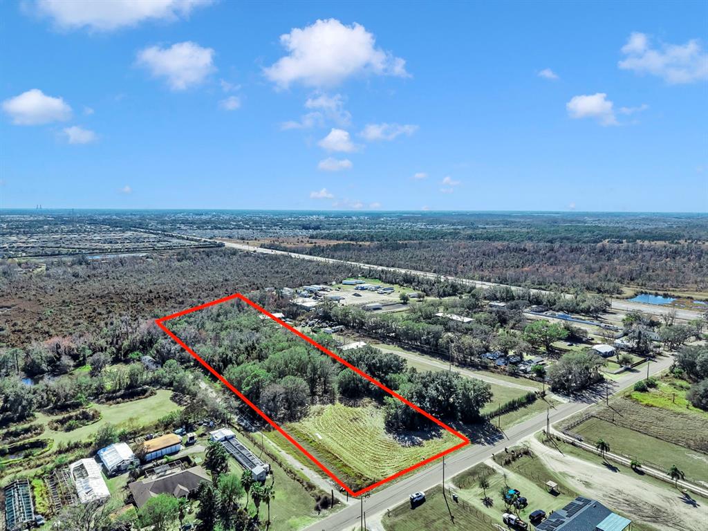10611 Sumner Road Wimauma, FL 33598 - Photo 26 of 30 an aerial view of a city