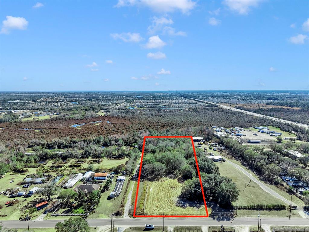 10611 Sumner Road Wimauma, FL 33598 - Photo 30 of 30 an aerial view of multiple house
