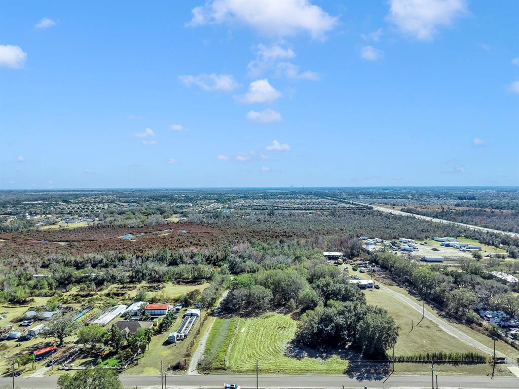 10611 Sumner Road Wimauma, FL 33598 - Photo 3 of 30 an aerial view of multiple house