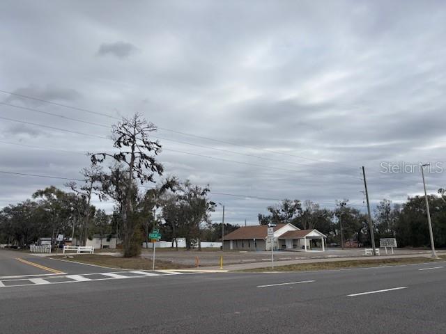 10611 Sumner Road Wimauma, FL 33598 - Photo 5 of 9 a view of a city street next to a building