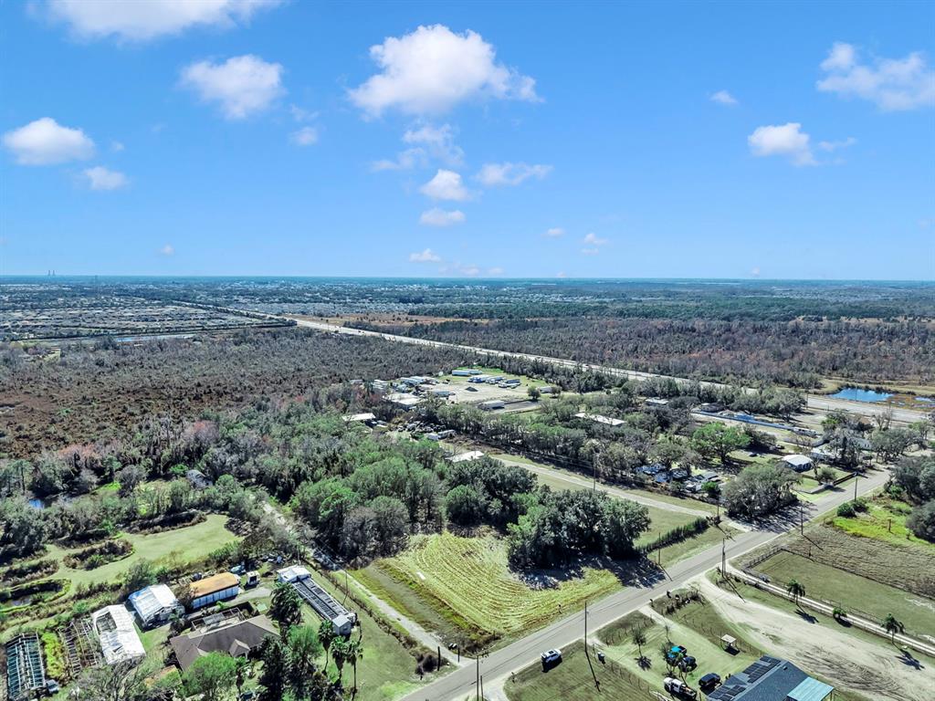 10611 Sumner Road Wimauma, FL 33598 - Photo 5 of 30 an aerial view of multiple house