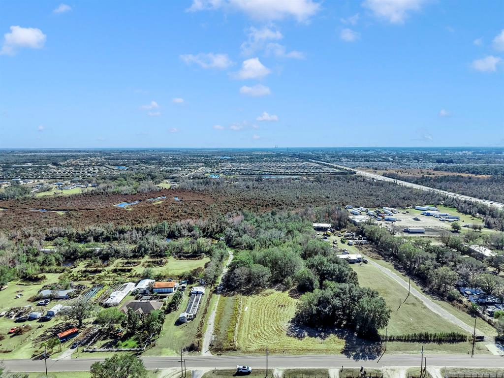 10611 Sumner Road Wimauma, FL 33598 - Photo 6 of 30 an aerial view of a city