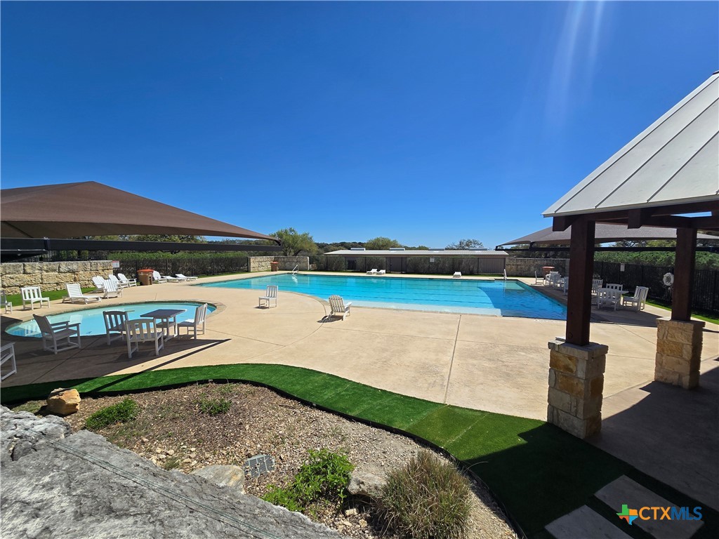 237 Roy Nichols Blanco, TX 78606 - Photo 13 of 18 a view of a swimming pool with a patio