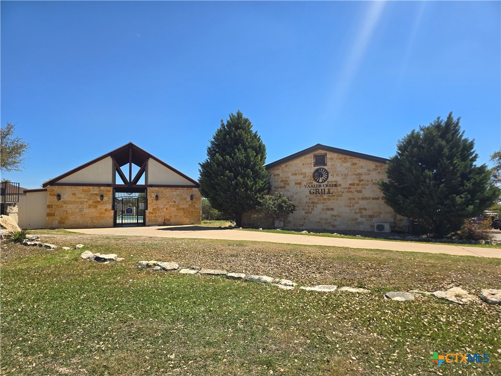 237 Roy Nichols Blanco, TX 78606 - Photo 2 of 18 a view of a big room with a yard