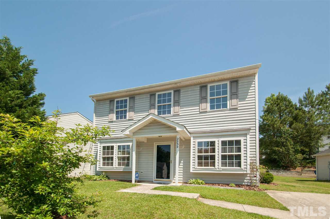 2232 Springhill Avenue Raleigh, NC 27603 - Photo 1 of 19 front view of a house with a yard
