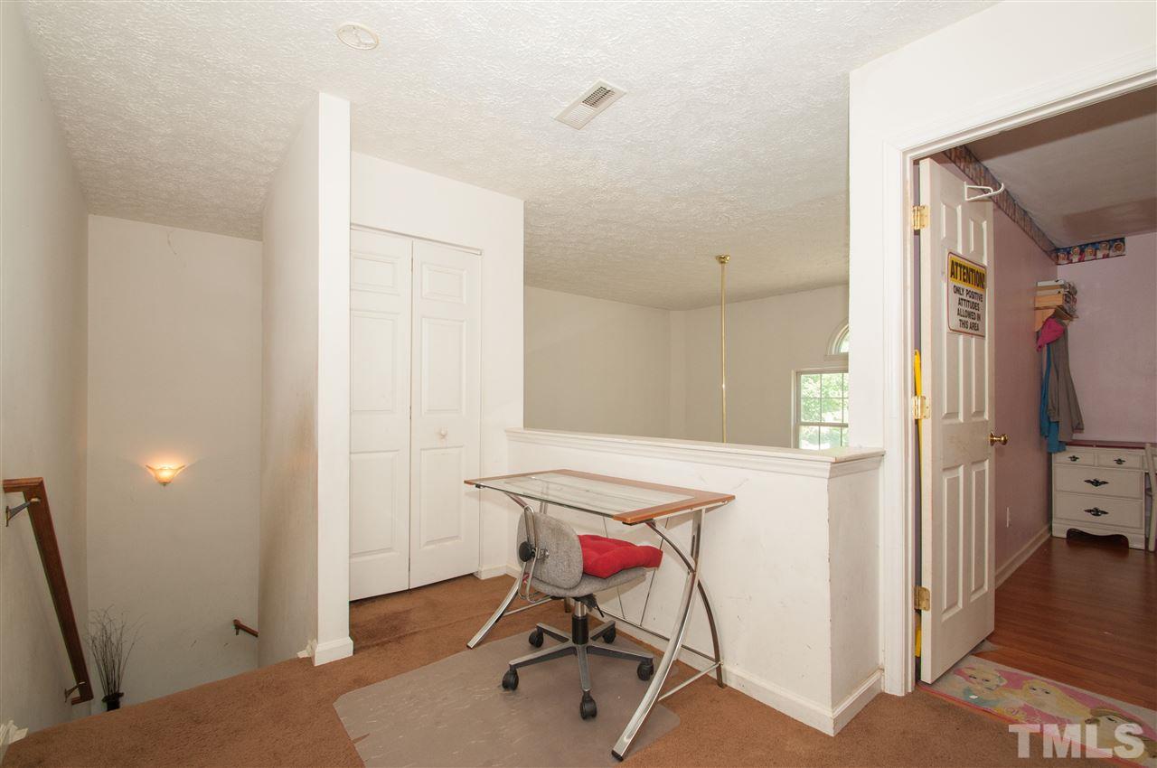 2232 Springhill Avenue Raleigh, NC 27603 - Photo 14 of 19 a workspace with furniture and a window