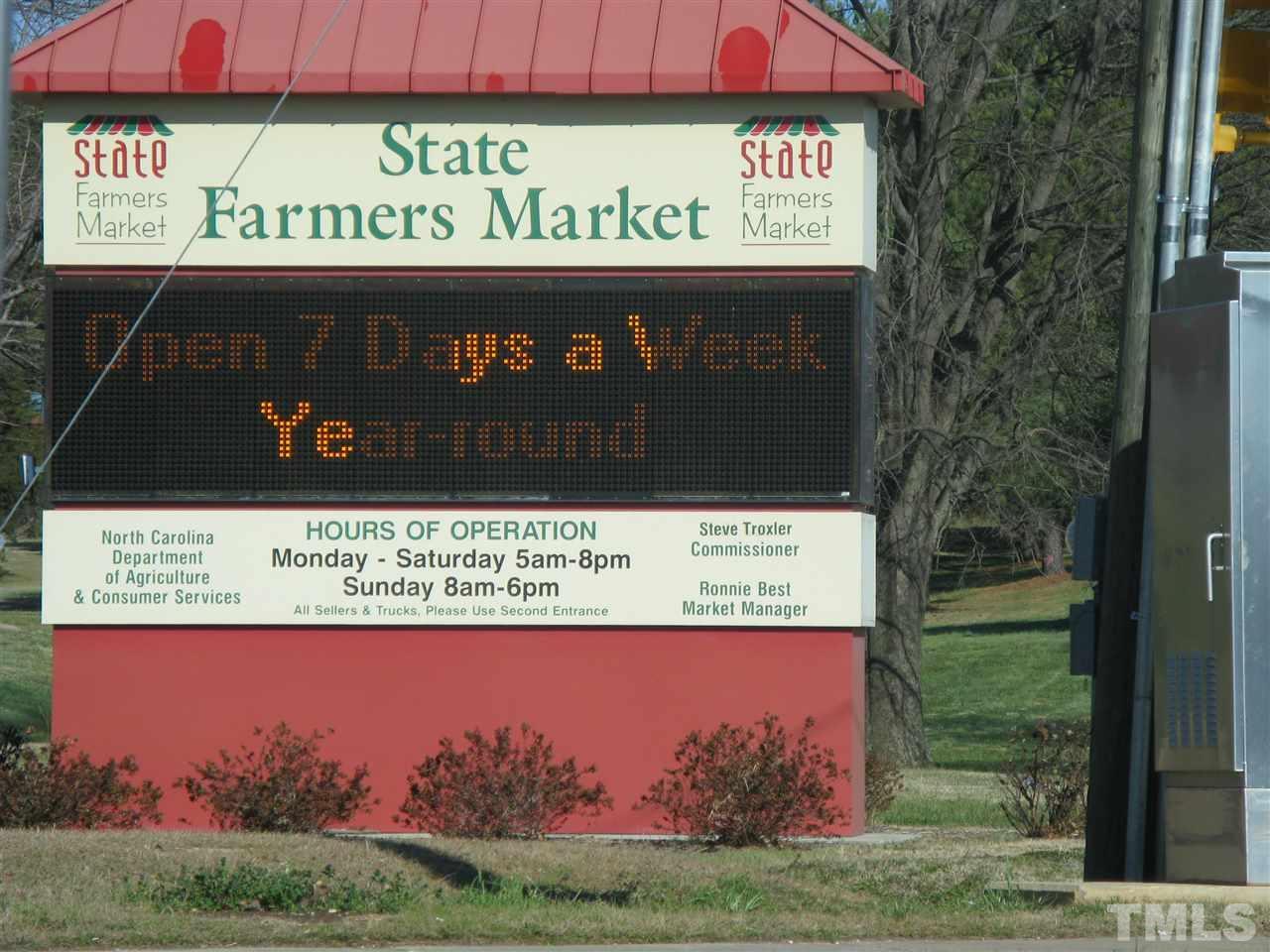 2232 Springhill Avenue Raleigh, NC 27603 - Photo 17 of 19 a sign on the wall with a city view