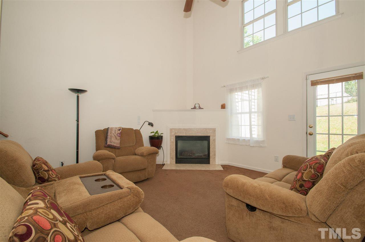 2232 Springhill Avenue Raleigh, NC 27603 - Photo 6 of 19 a living room with furniture or fireplace and a window