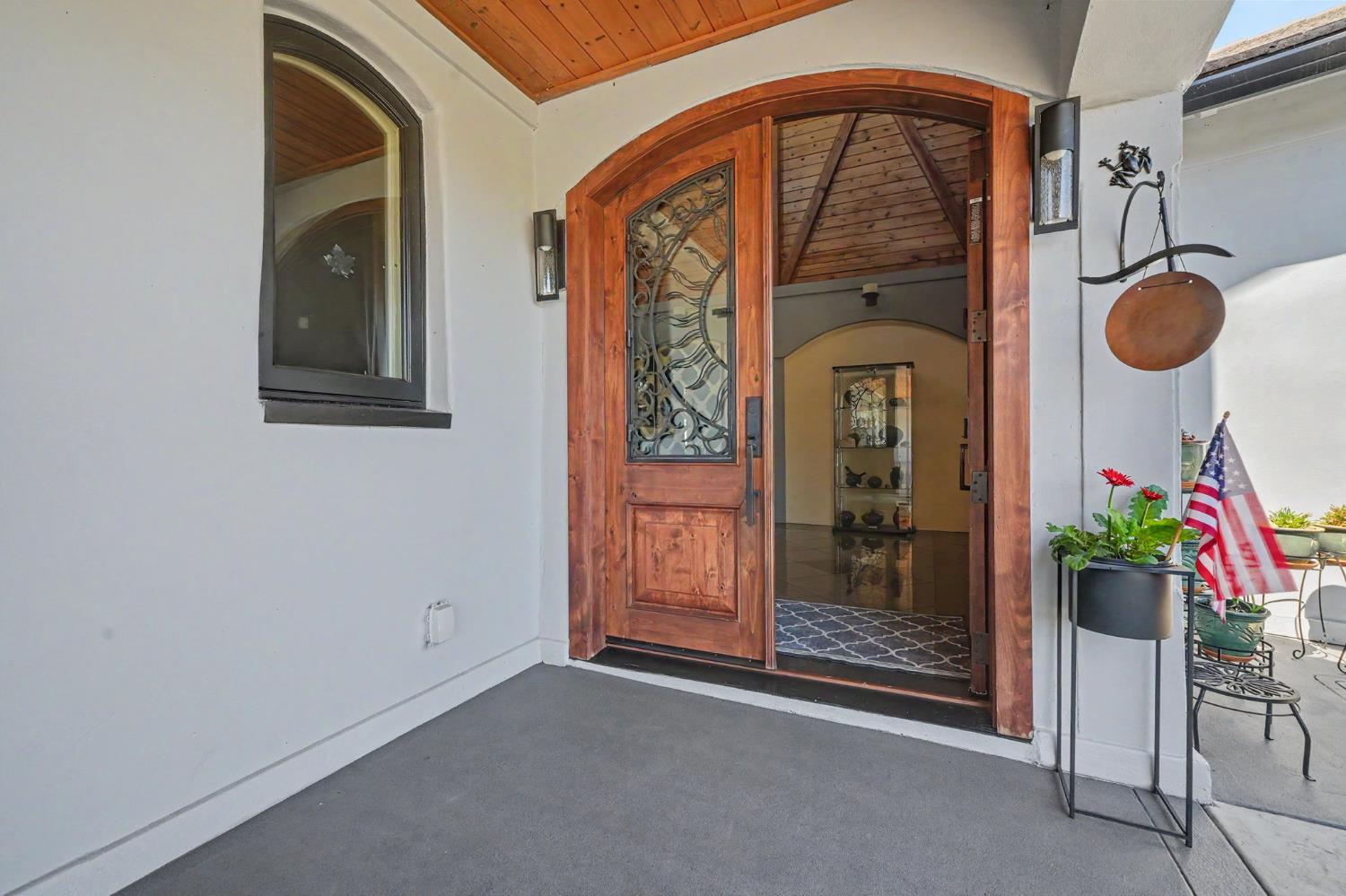 15070 Willow Creek Road Ione, CA 95640 - Photo 14 of 66 a view of a door and chair in the room