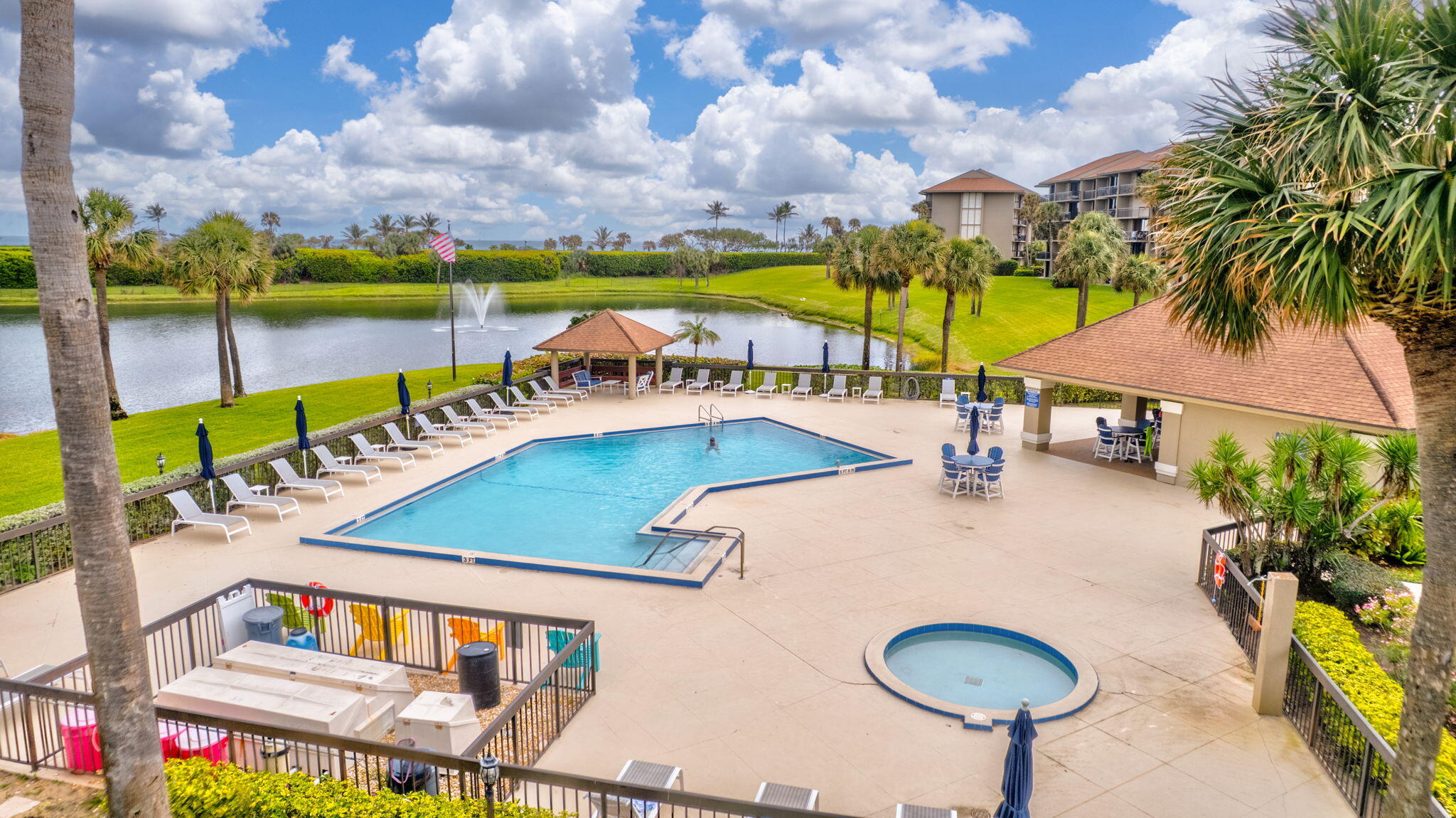 201 South Seas Drive, Unit 302 Jupiter, FL 33477 - Photo 2 of 19 swimming pool view with a seating space