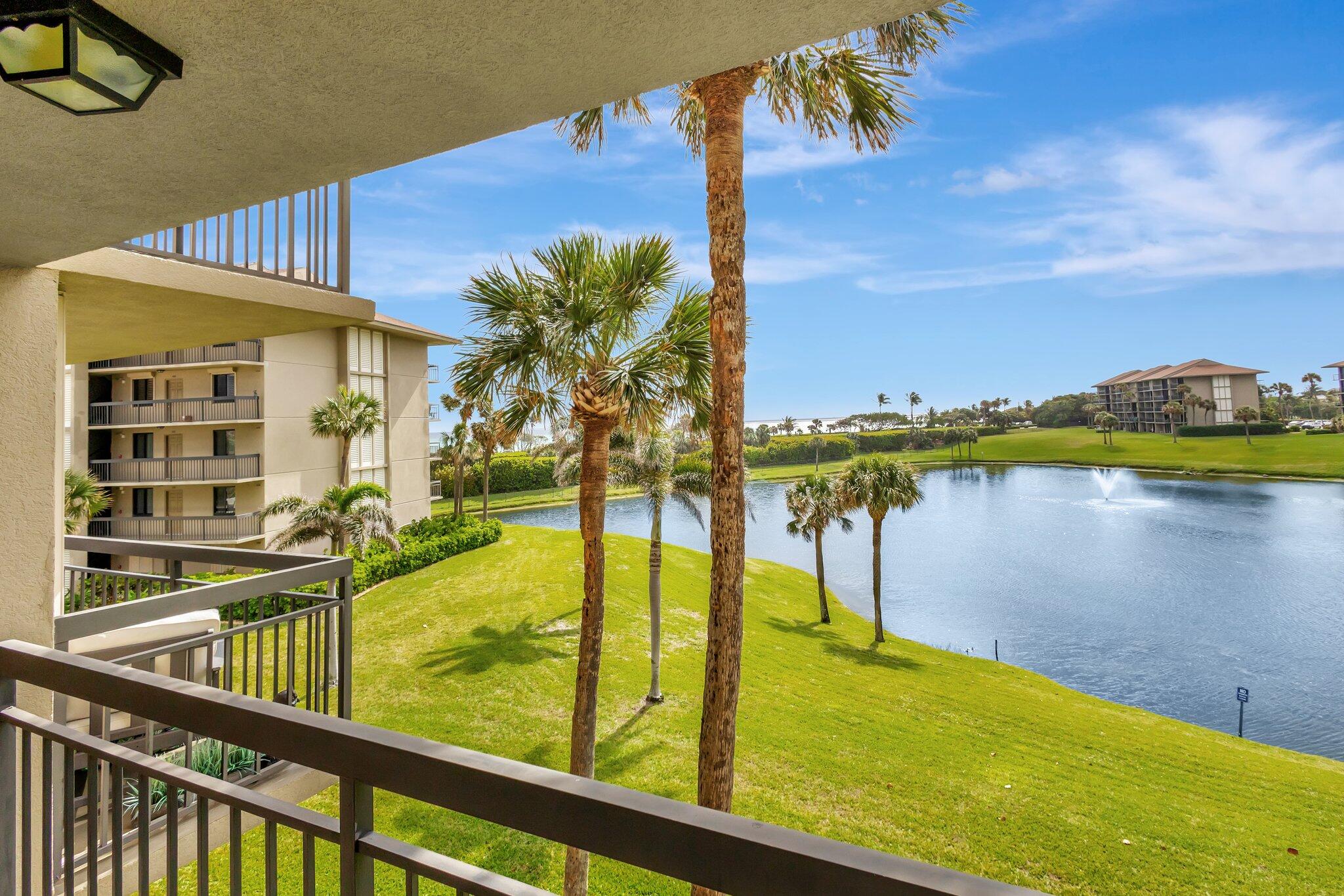 201 South Seas Drive, Unit 302 Jupiter, FL 33477 - Photo 5 of 19 a view of lake from a balcony