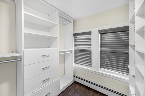 a view of a closet in the kitchen